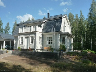 Красивый двухуровневый дом на берегу озера в  новом районе города Taipalsaari 32061